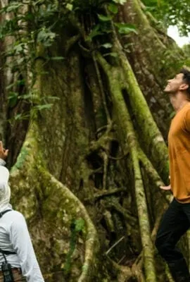 couple hiking in the amazon rainforest
