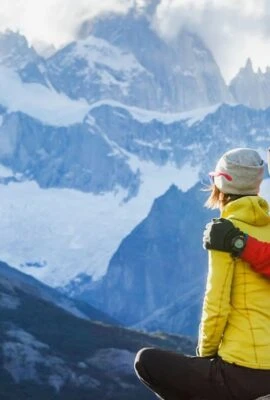 Couple admiring the mountains in Patagonia
