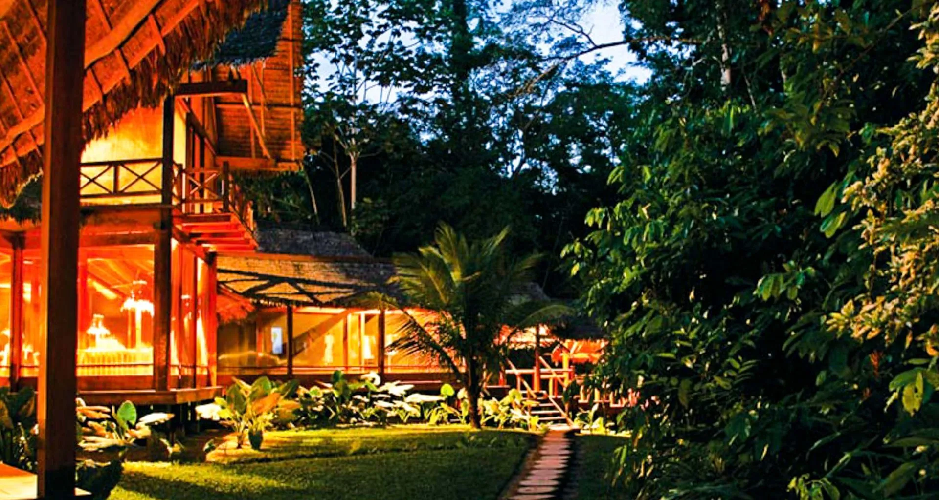Inkaterra Reserva Amazonica exterior and path by evening