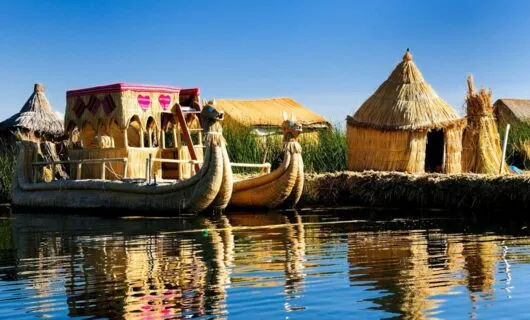 Canoes and huts on Lake Titicaca