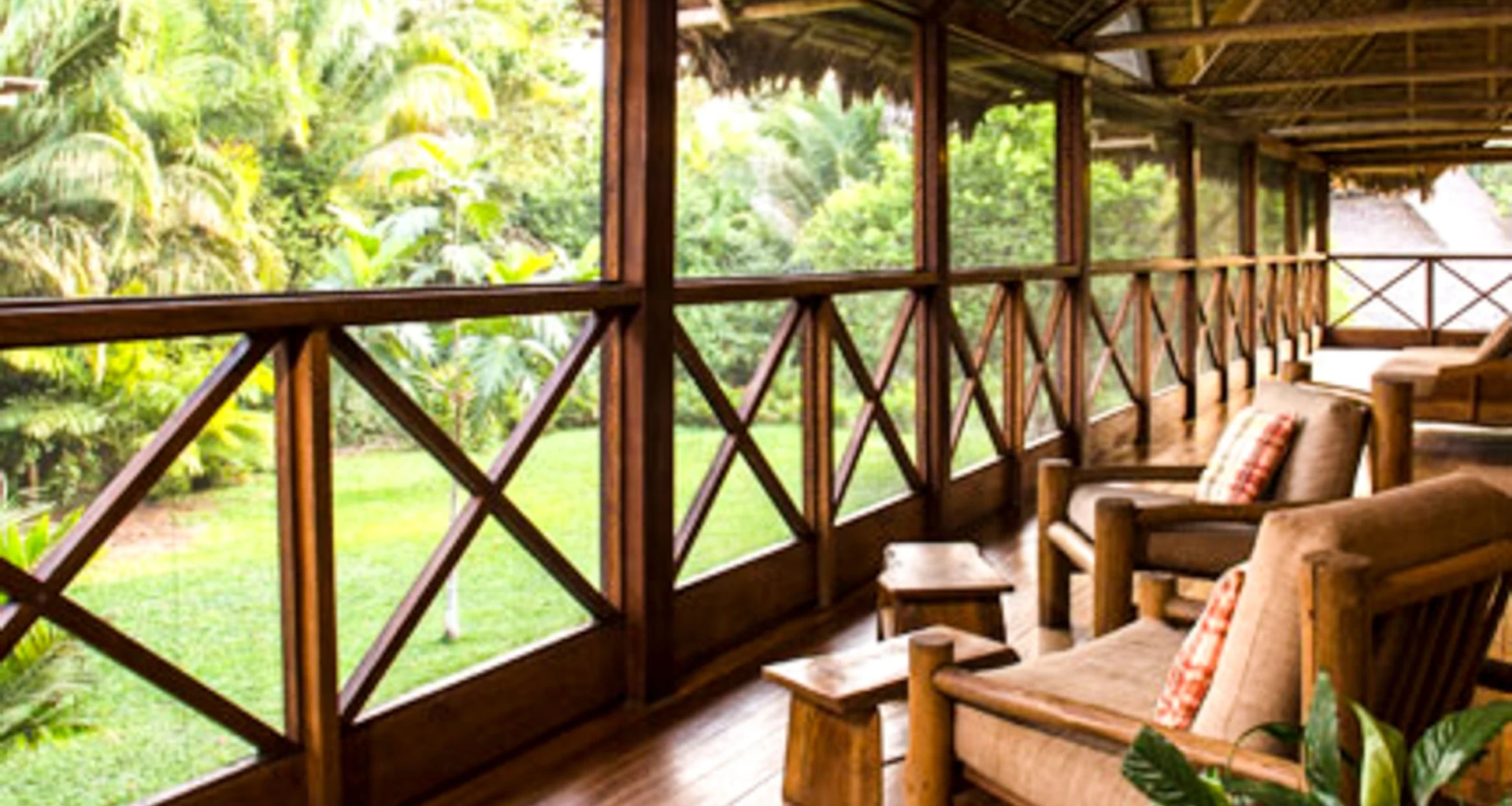Outdoor chairs on deck of Inkaterra Hacienda Concepciòn Lodge