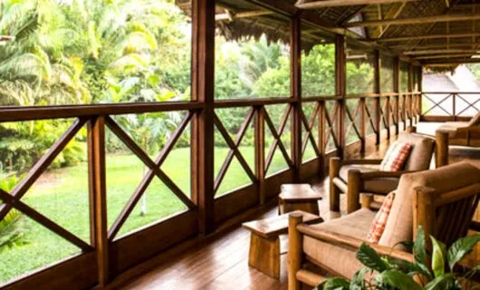 Outdoor chairs on deck of Inkaterra Hacienda Concepciòn Lodge