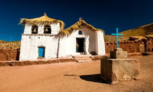 Church with blue cross out front in Machuca, Chile