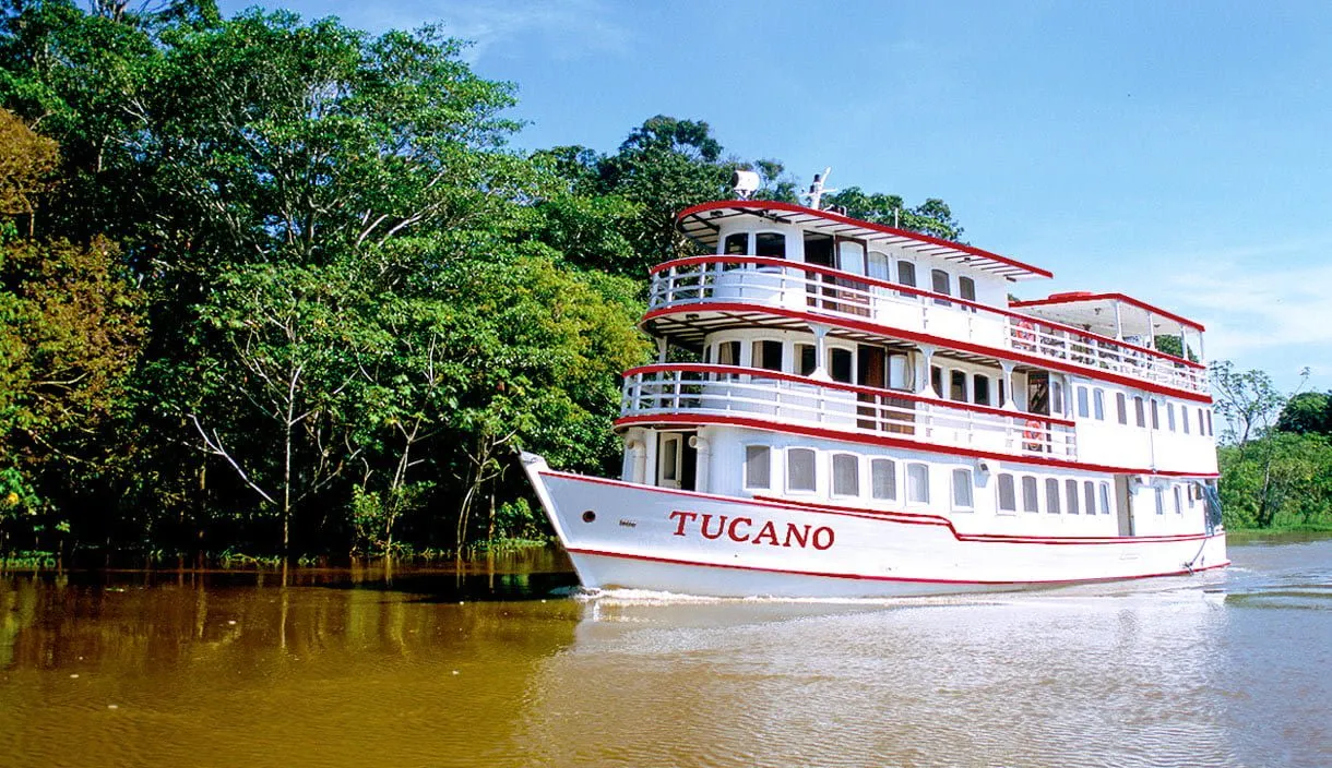 Motor yacht travels down South America river