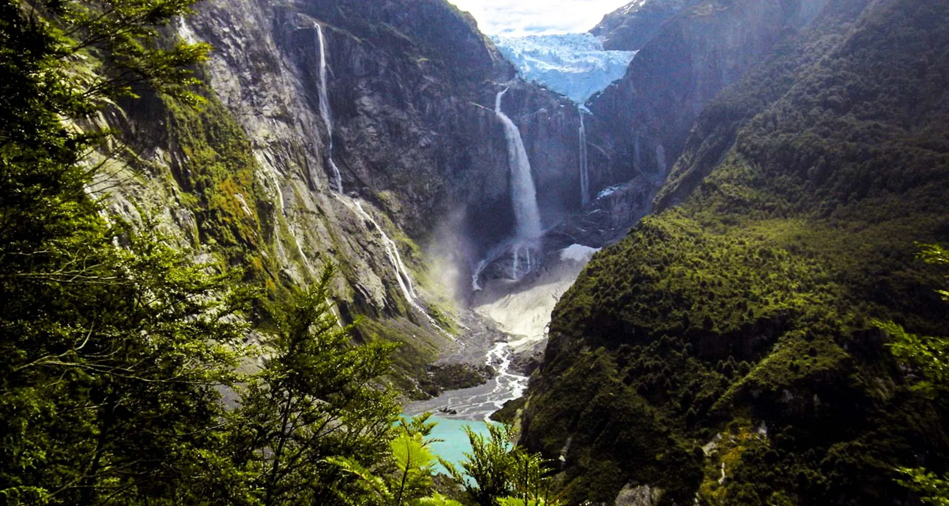 View into mountain valley with waterfalls