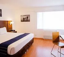 bed in casa andina hotel room in peru