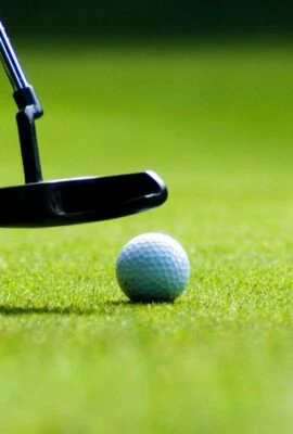 Close up of putting on golf green