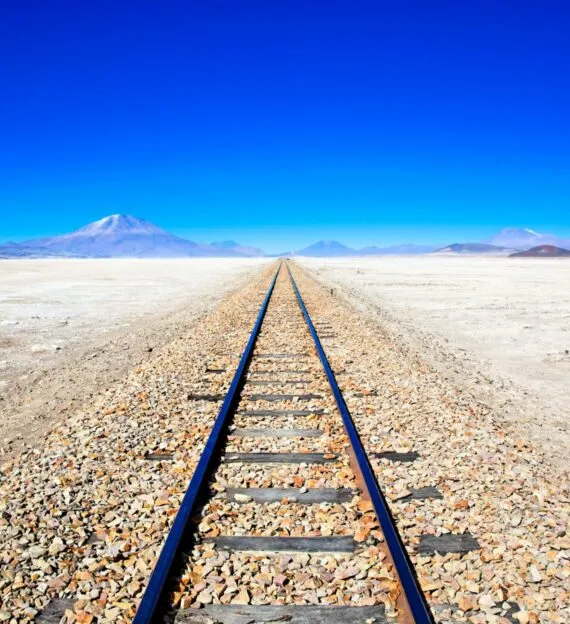 Train track across salt flats of Bolivia