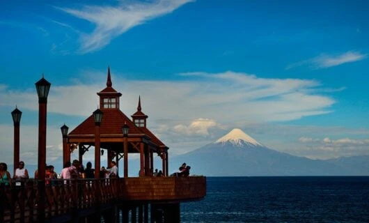 scenic boardwalk in Puerto Montt with stunning view of Osorno Volcano