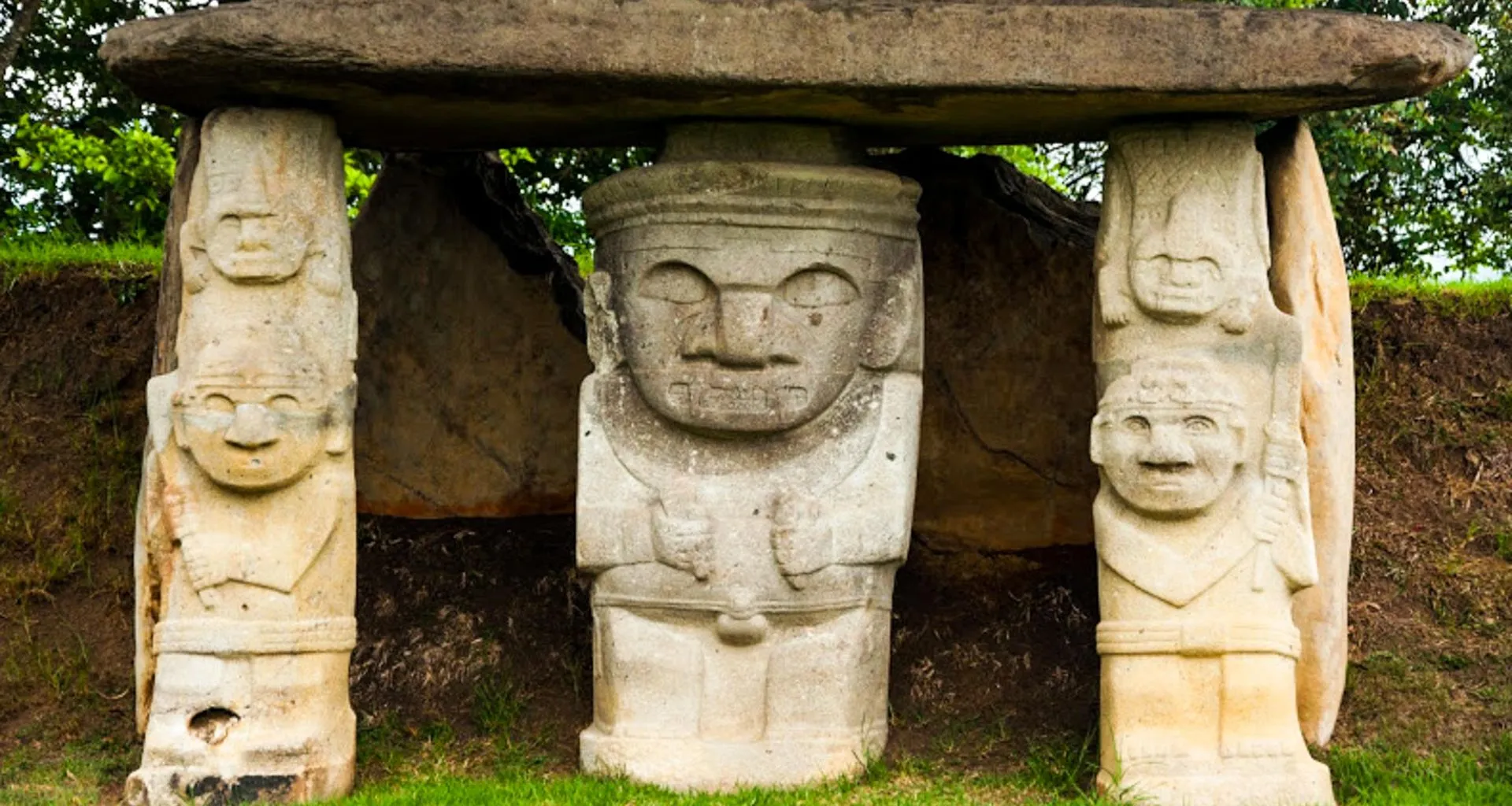 Statues hold up rock table