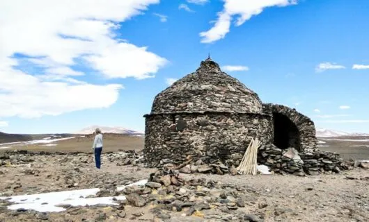 Stone hut on rocky South America landscape