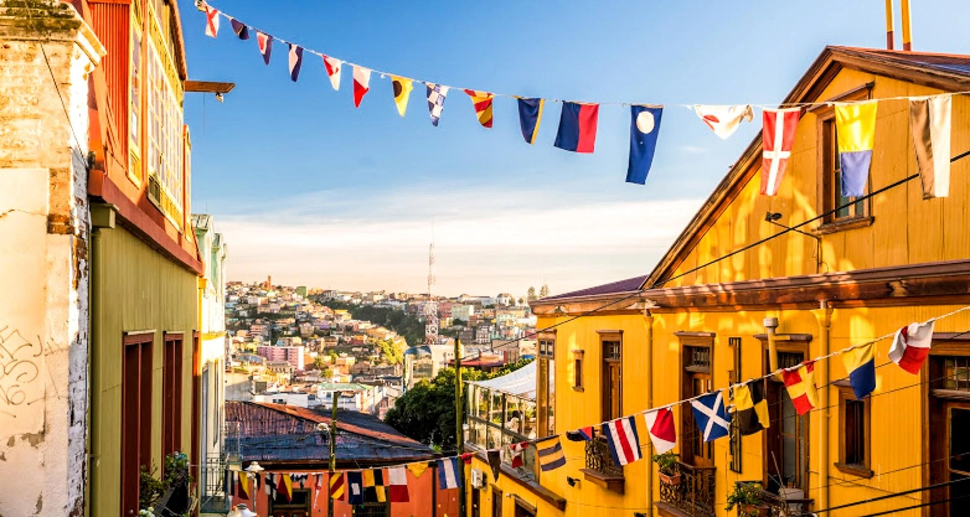 Small flag lines hang across street in Valparaiso, Chile