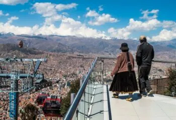 Woman in traditional clothing at a view point in La Paz Bolivia
