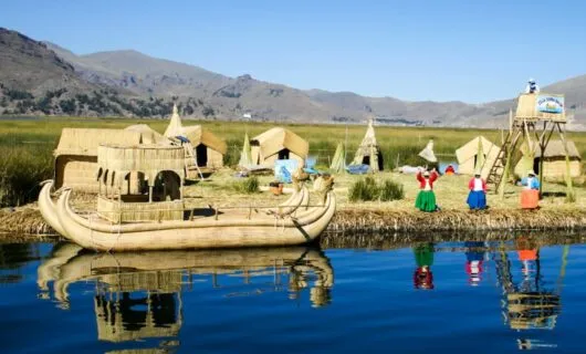 South America tribal village with canoe