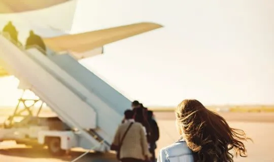 young-woman-traveling-to-south-america-by-plane