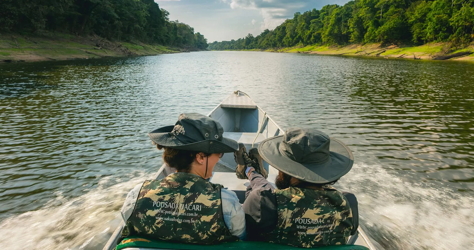two people on a boating excursion at the uakari lodge