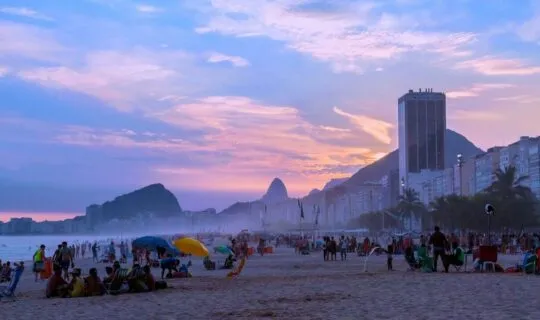 busy-copacabana-beach-at-sunset