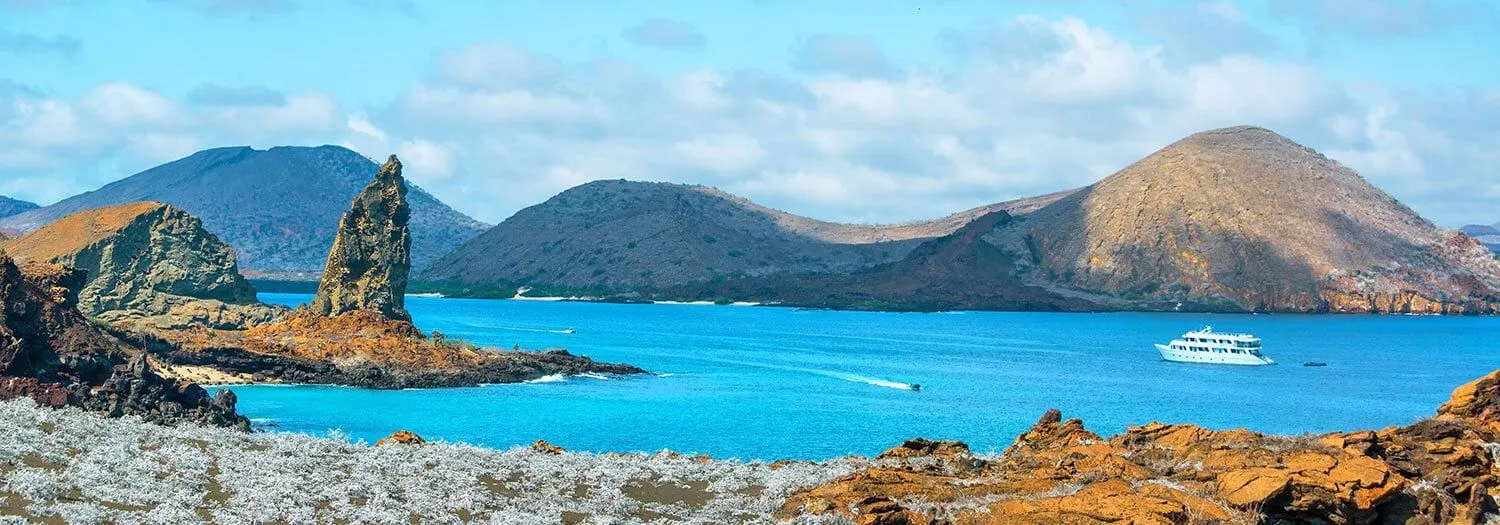 Ecuador cruise explores the Galapagos and pinnacle rock during wet season