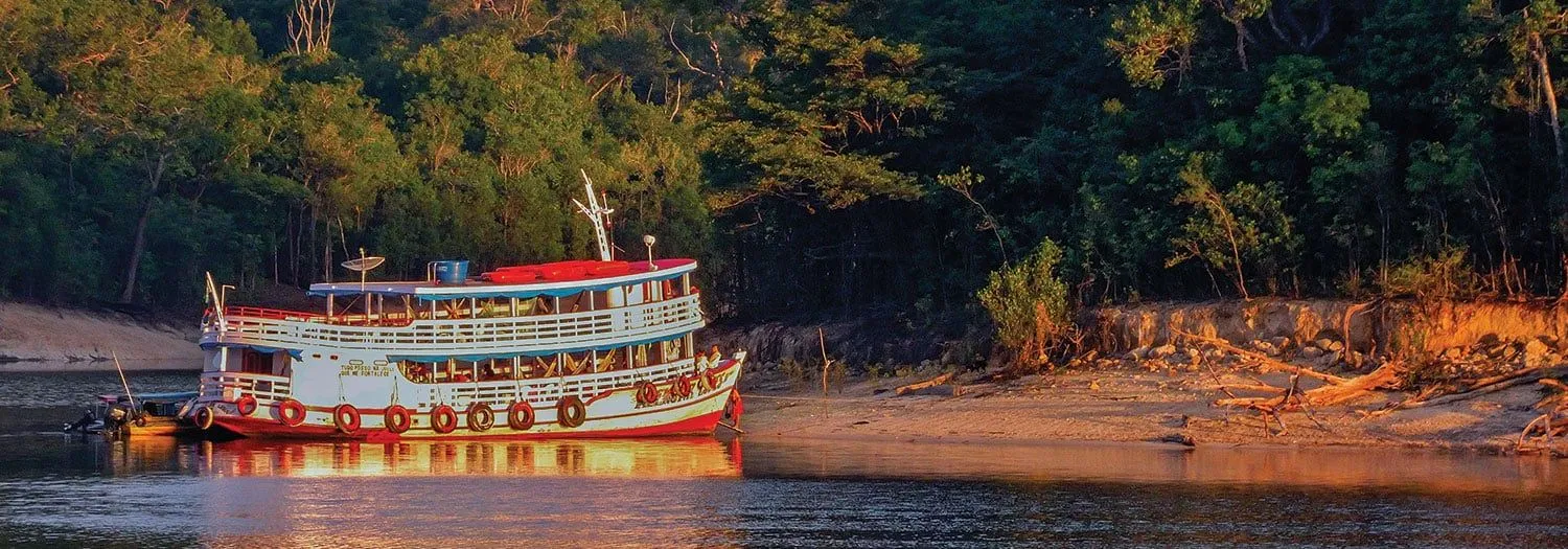Boat on the Amazon River during high water season