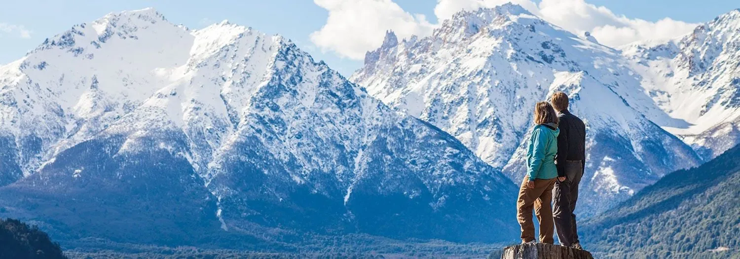 Couple hiking in Argentina's winter outside of Bariloche