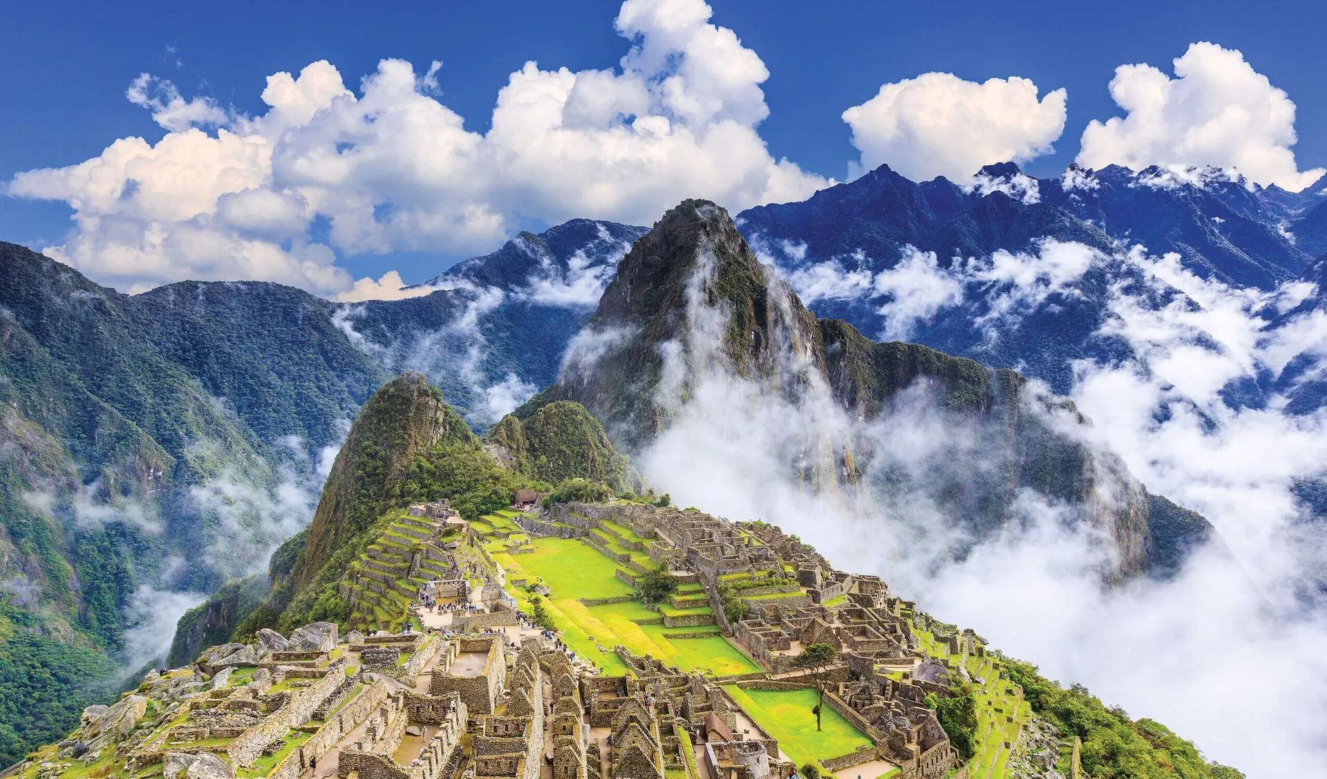 machu picchu surrounded by clouds