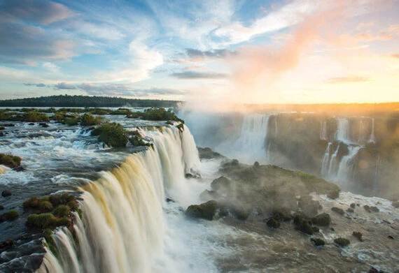 Aerial view of rushing waterfalls of Iguazu Falls