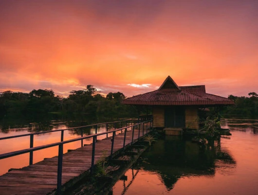 side view of lodge resort suite during sunset