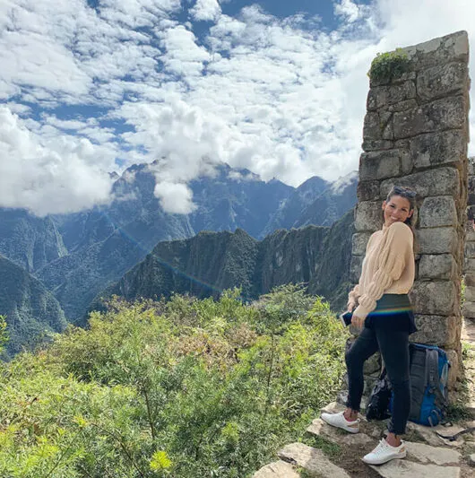 margo standing on a stone at Machu Picchu