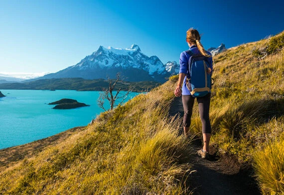 woman hiking in torres del paine chile patagonia