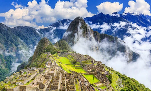 view of machu picchu on a sunny day